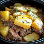 Slow Cooker Steak and Cheddar Potato Casserole